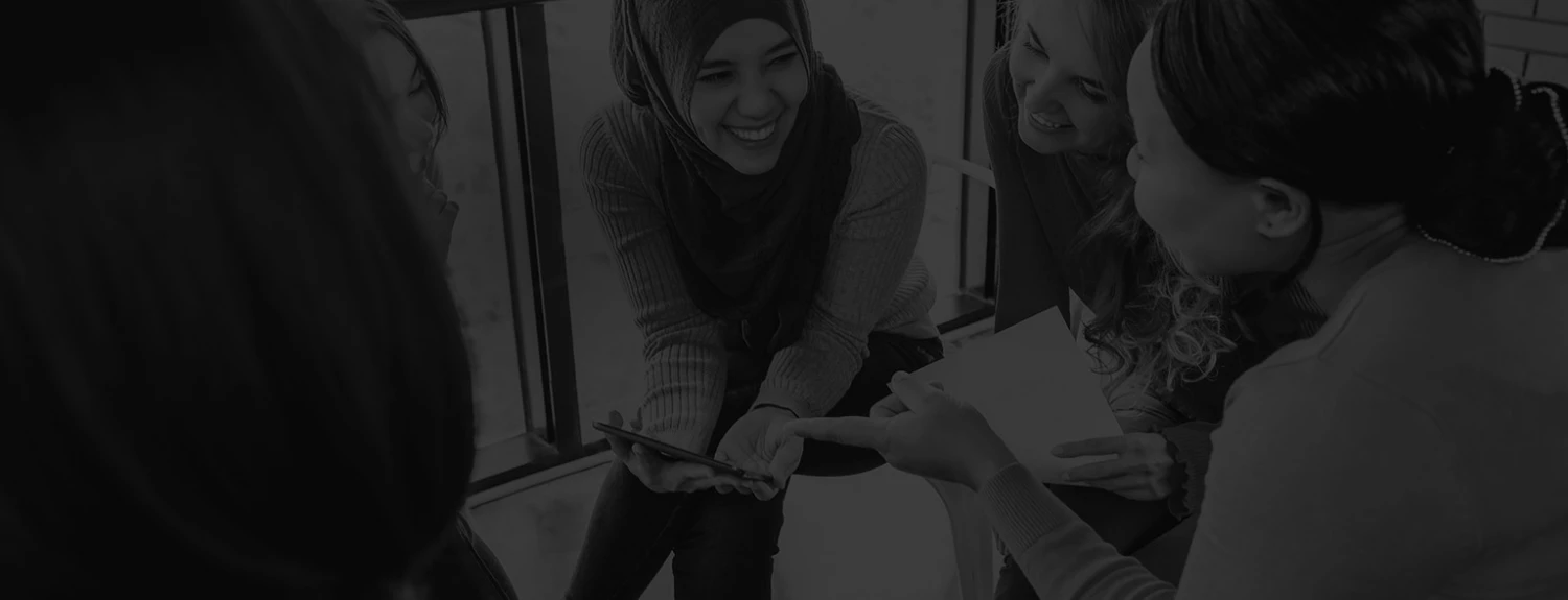 Young people smiling having a conversation